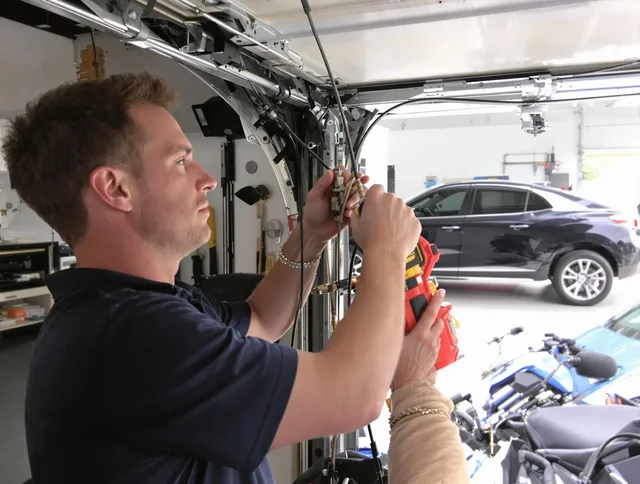 San Gabriel Garage Door Repair safety certified technician performing cable replacement in San Gabriel