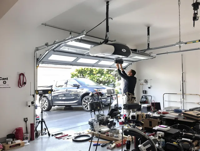 San Gabriel Garage Door Repair specialist installing smart garage door opener system in San Gabriel home
